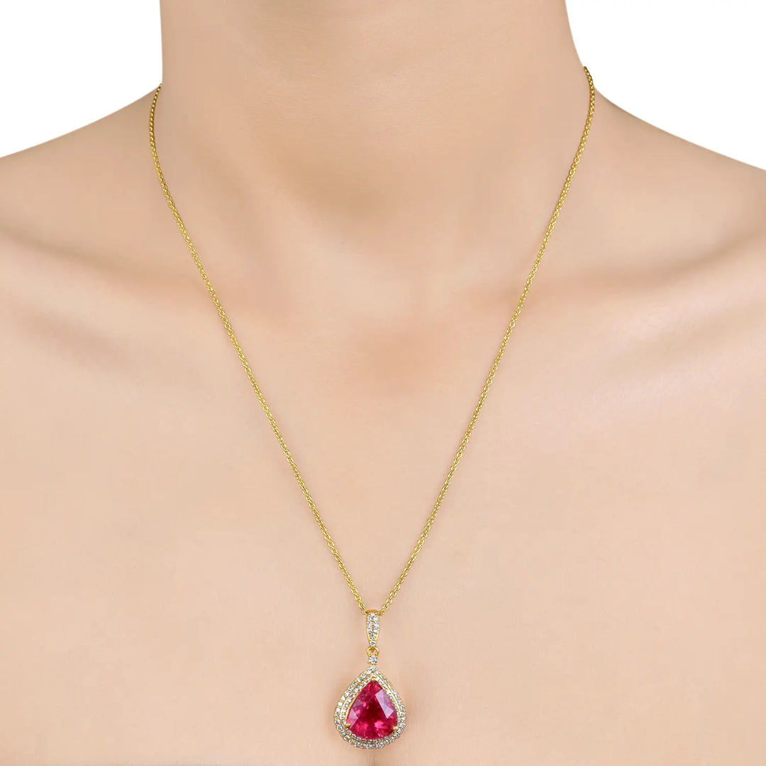 Sovereign Teardrop Pendant in 18 Kt