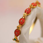 Load image into Gallery viewer, Coral Flora Garland Bangle in 18 Kt
