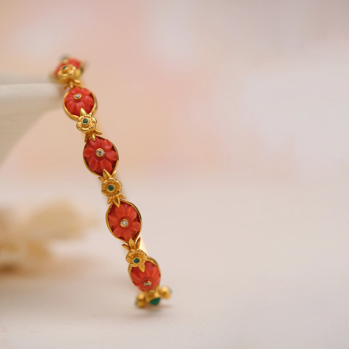 Coral flora garland bangle in 18 kt